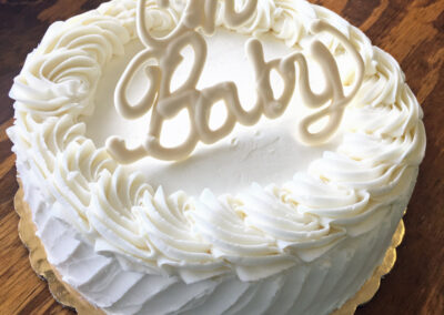 Oh Baby cheesecake, baby reveal cake